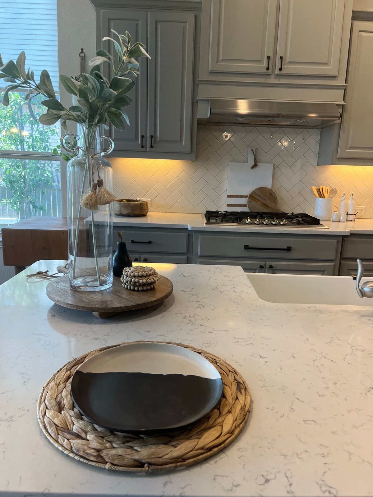 Styled dining table detail in a staged Austin home