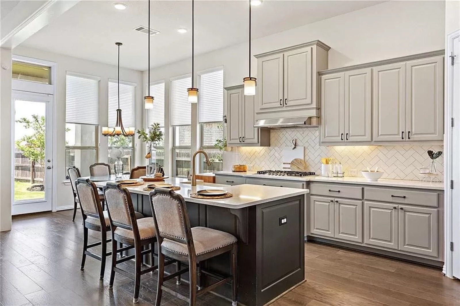 Staged kitchen and dining area